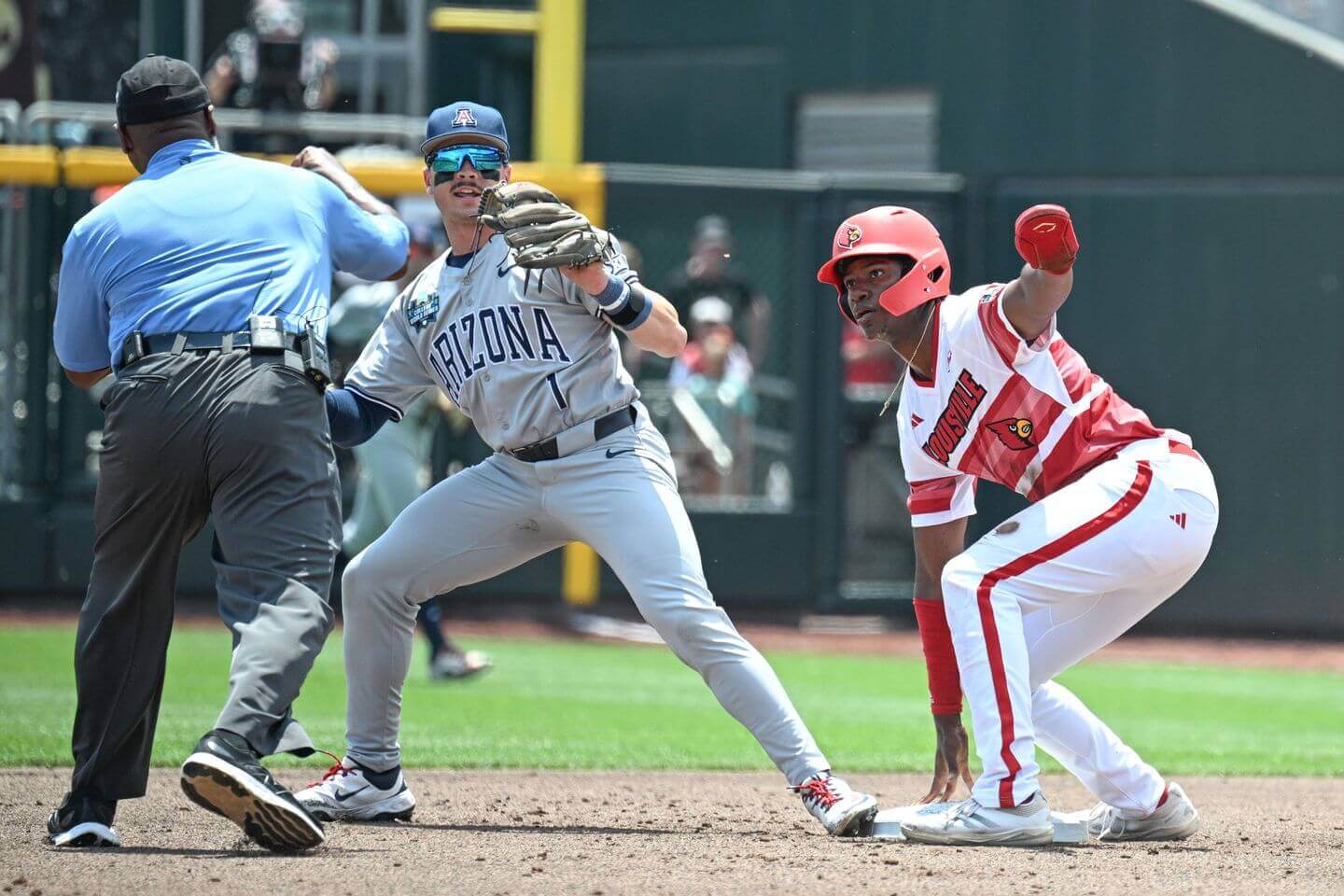 College World Series 2025 live updates: Louisville beats Arizona, Wildcats eliminated from Omaha field